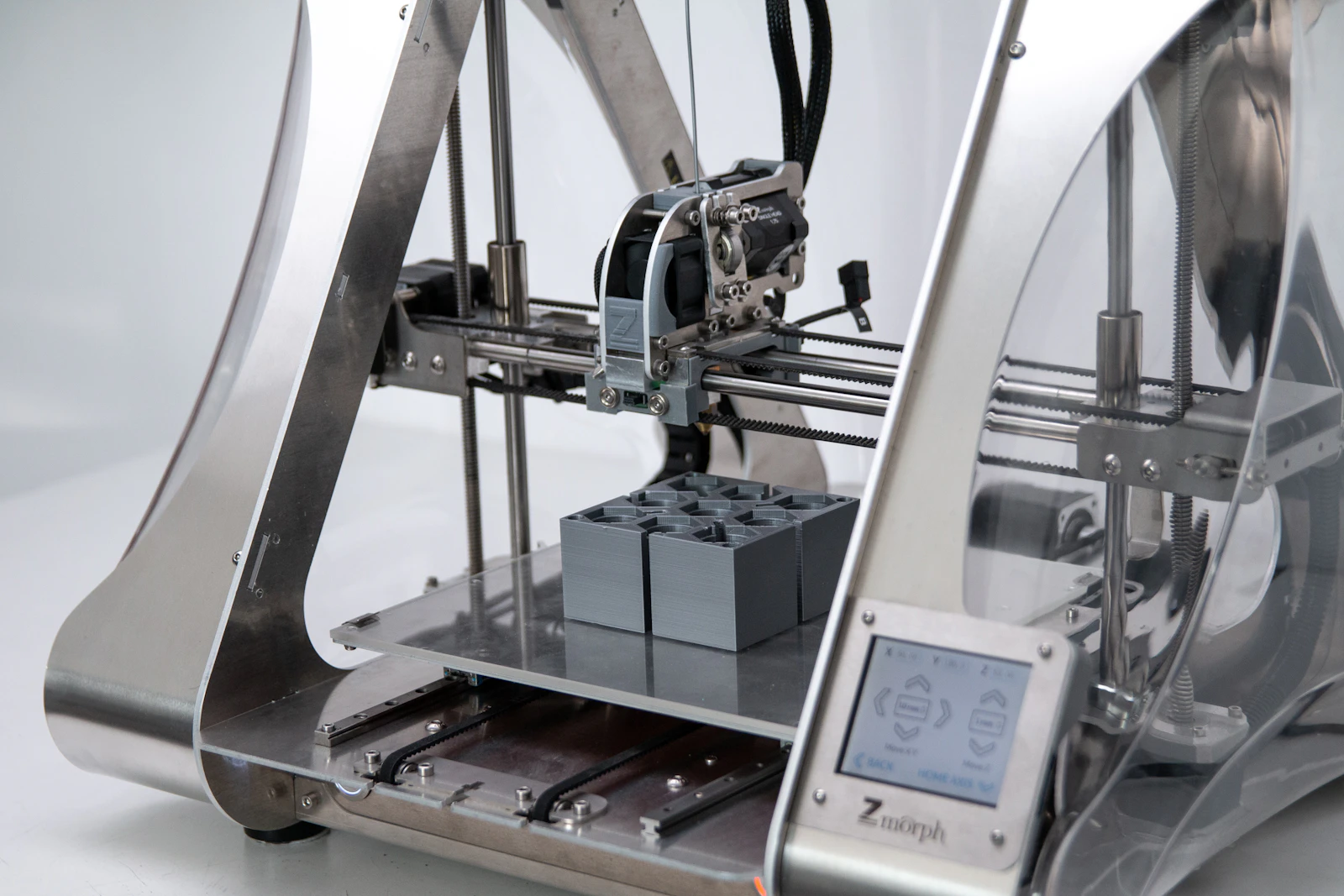 Impressora 3D produzindo uma peça